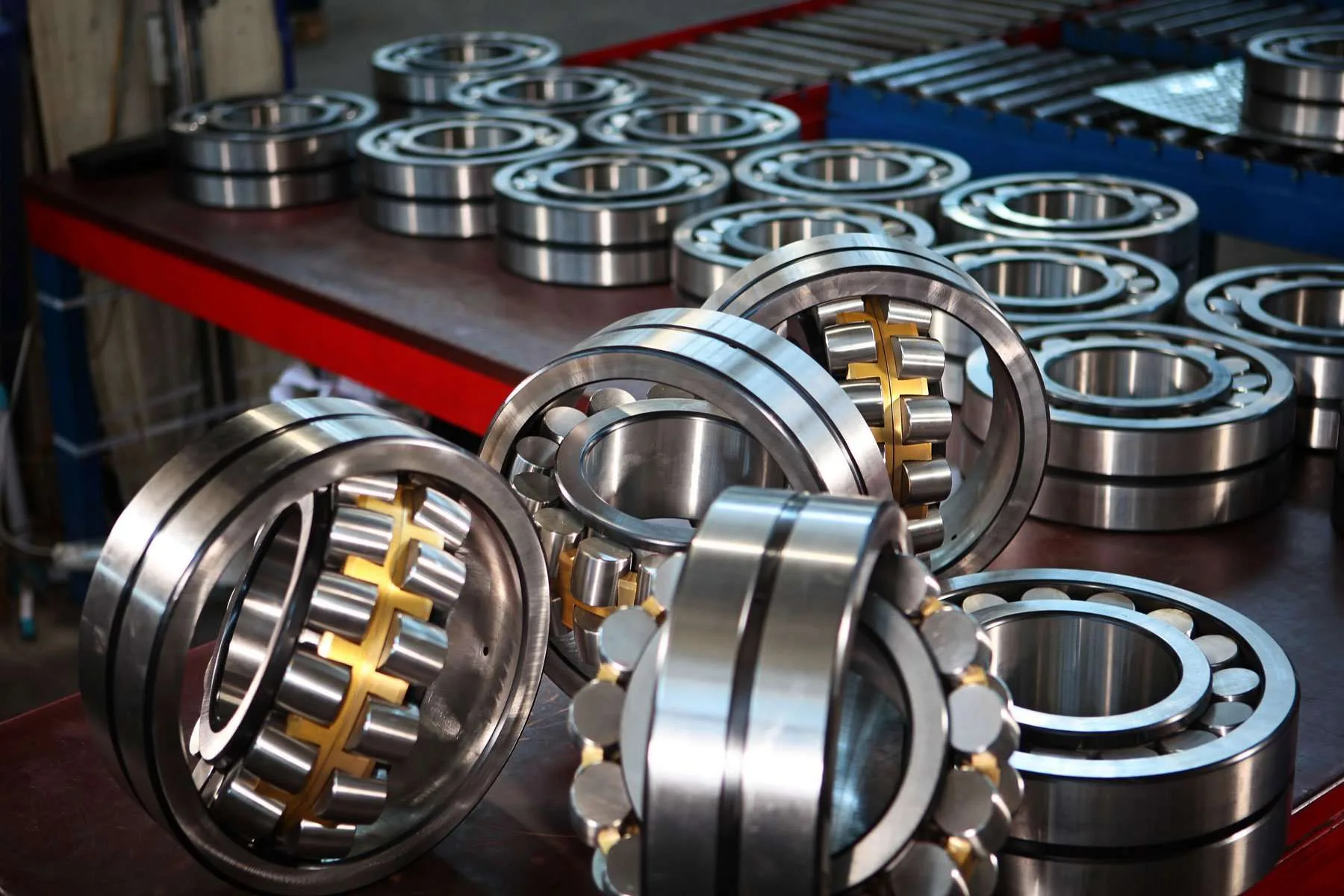 An array of spherical-roller bearings on the shop bench for a centrifuge rebuild.