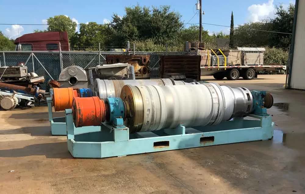 A worn decanter centrifuge rotating assembly before rebuild.