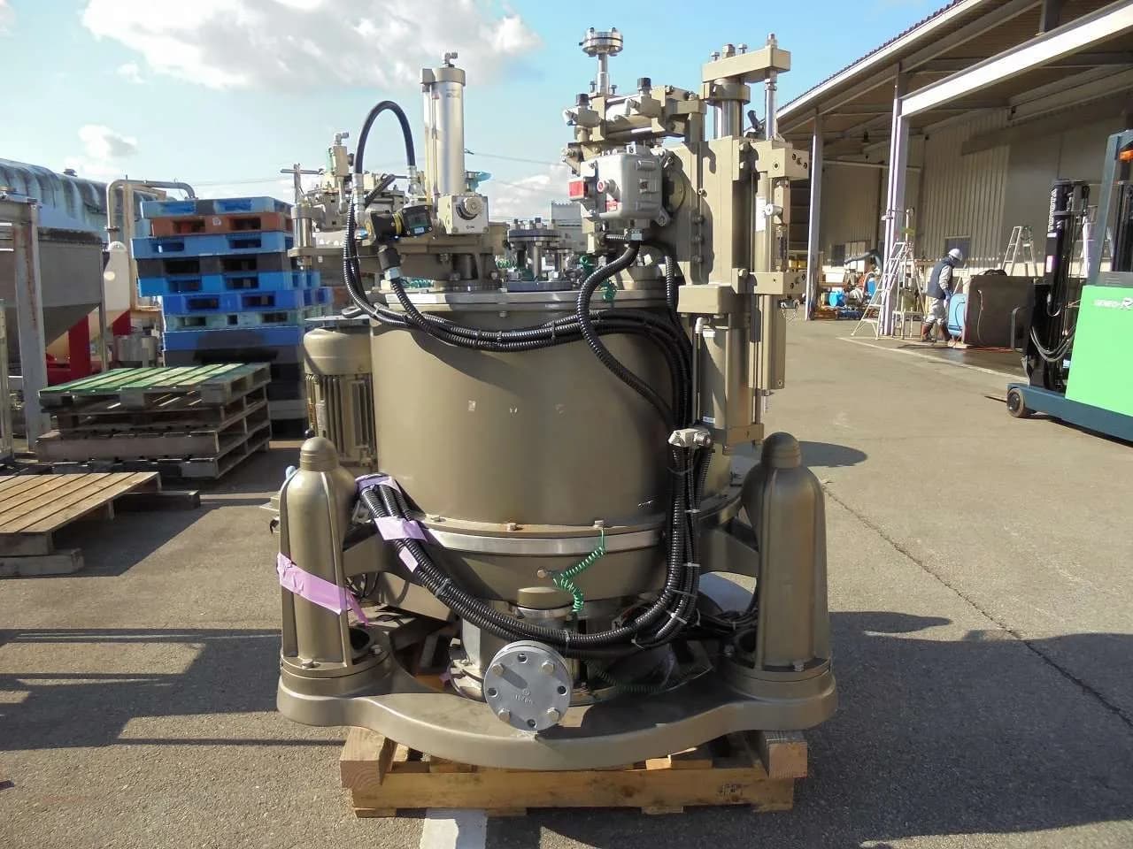 A vertical bottom-discharge peeler basket centrifuge on a pallet at Gear Force Machine.
