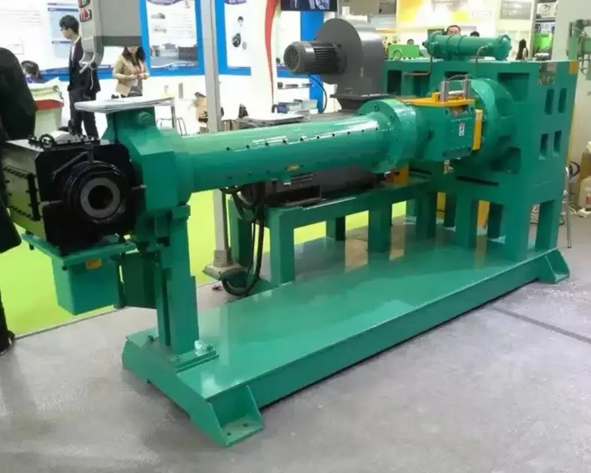 A completed green-painted extruder rebuild, ready for delivery back to the customer.