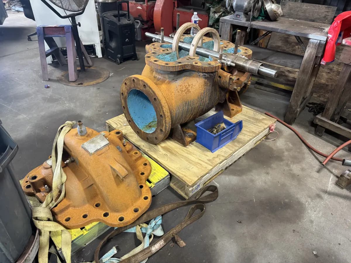 A corroded split-case pump casing and rotor pulled for teardown and inspection at the Gear Force Machine shop.